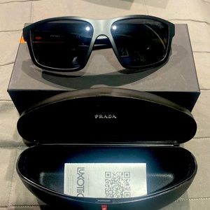 A brand new Prada sun glasses